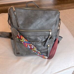 Gray Leather Backpack with Colorful Strap